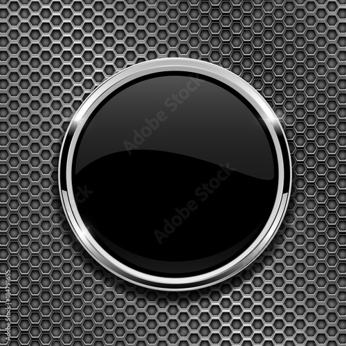 Black round glass button with chrome frame on metal perforated background