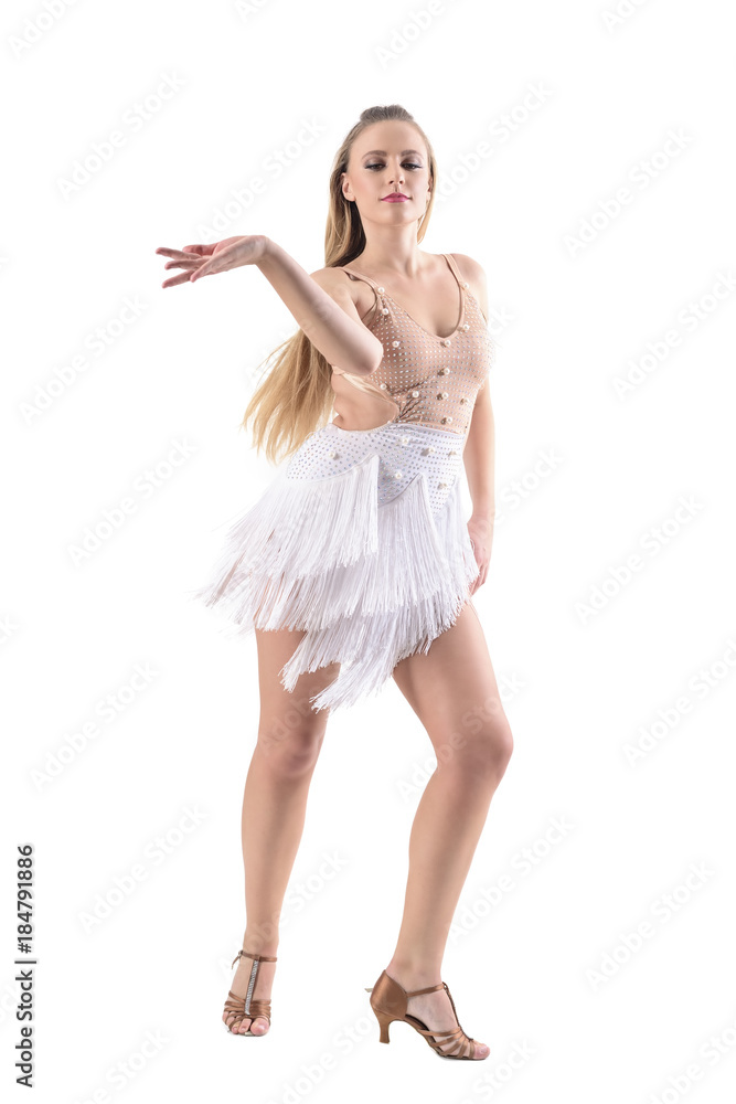 Graceful woman dancing with moving flowing hair and dress elegantly while looking down. Full body length portrait isolated on white background. Graceful woman dancing with moving flowing hair and dress elegantly while looking down. Full body length portrait isolated on white background.