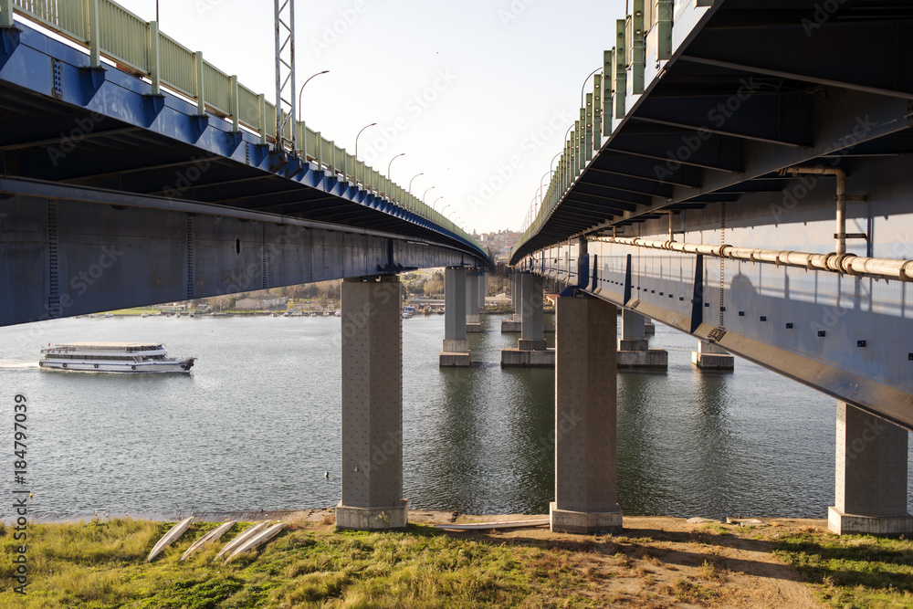 A metal and concrete bridge and sea in the city of Istanbul A metal and concrete bridge and sea in the city of Istanbul