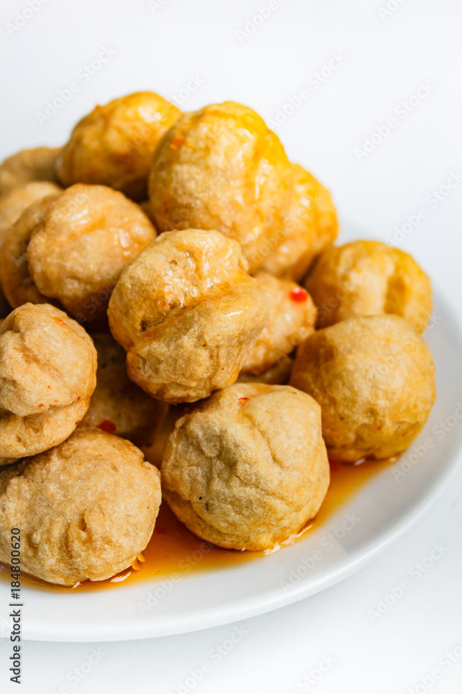 Fried fishballs and sweet sauce. Fried fishballs and sweet sauce.