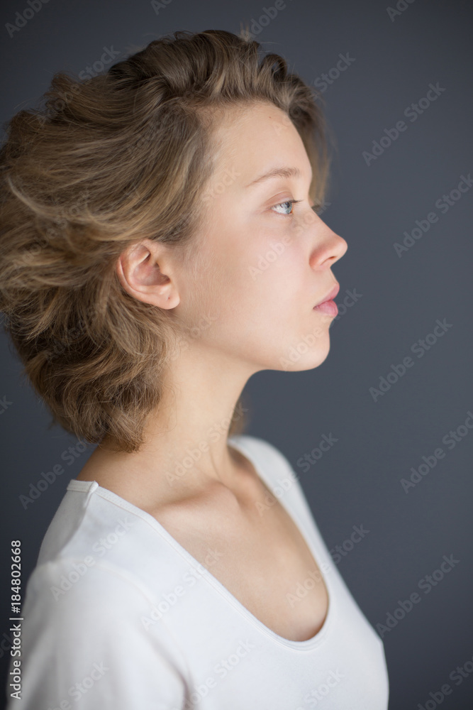 Portrait of young upset lady thoughtfully looking aside isolated Portrait of young upset lady thoughtfully looking aside isolated