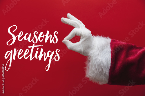 Wallpaper Mural Santa Claus hand okay gesture with a festive message Torontodigital.ca