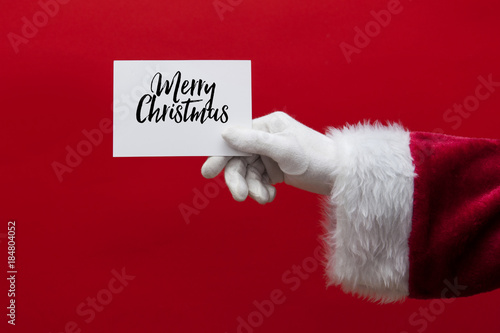 Wallpaper Mural Santa Claus hand holding a Christmas sign Torontodigital.ca