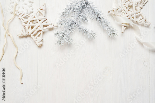 Mockup christmas or new year frame composition with space for your text. christmas decorations on white wooden background. holiday and celebration concept for postcard or invitation. top view