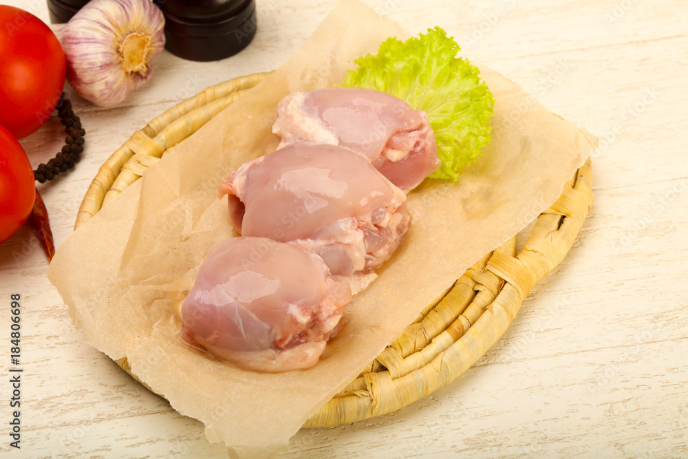 Boneless raw chicken thighs