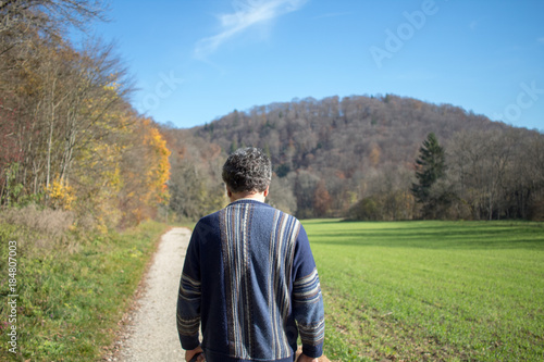 man walking in park