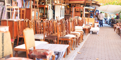 Athens, Greece. Vintage chairs collection at Monastiraki, an open air flea market photo