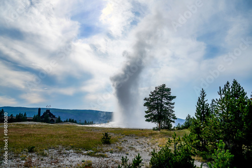 Old Faithful on time as usual in Yellowstone National Park Wyoming.