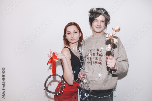 boy and girl with christmas things