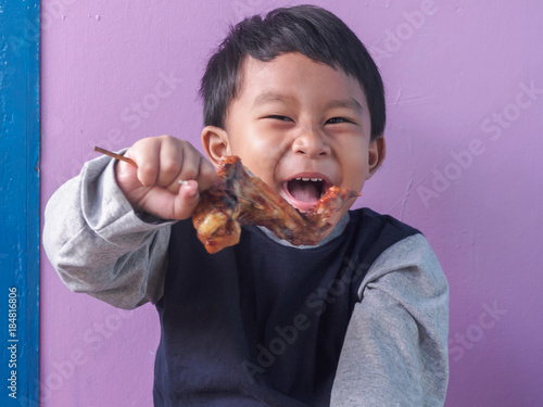 asian boy eating.