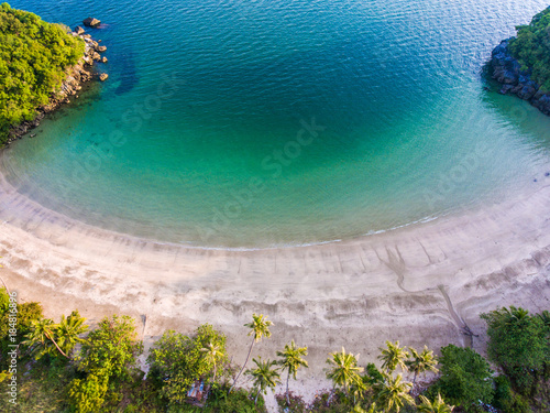 Aerial top view of scenic tropical beach with beautiful sunlight