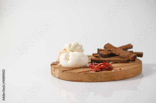 traditional Italian food, burrata cheese on a white background