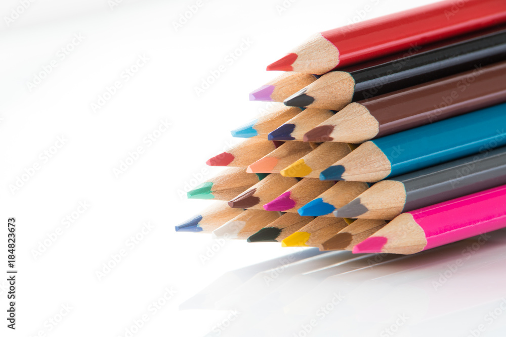 Stacked wooden coloured pencils Stacked wooden coloured pencils