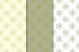 Snowflakes patterns. Set of olive green seamless backgrounds with christmas elements