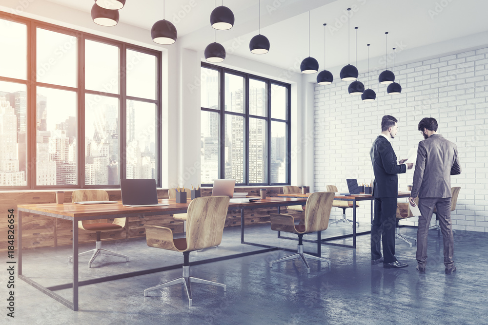 Fototapeta premium White brick open space office toned