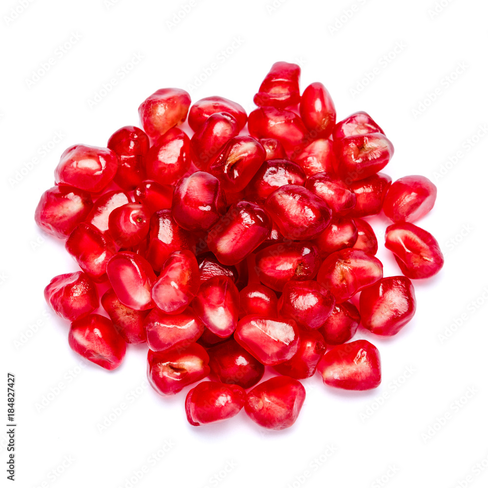 scattered pomegranate grain isolated on white scattered pomegranate grain isolated on white