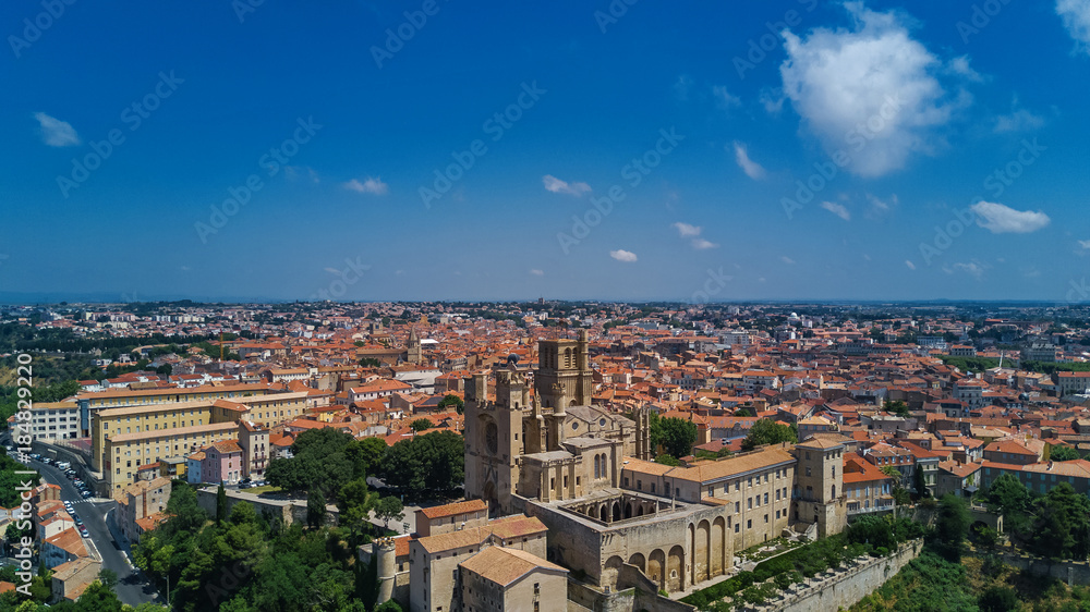 Aerial top view of Beziers town architecture and cathedral from above, South France
