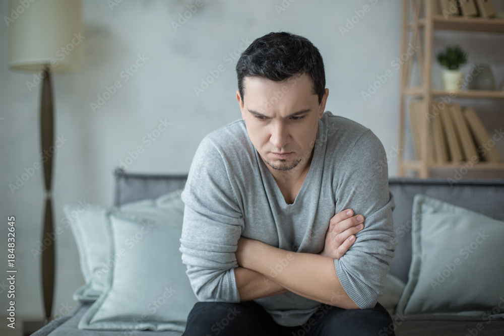 Man sitting upset psychology session mental health care