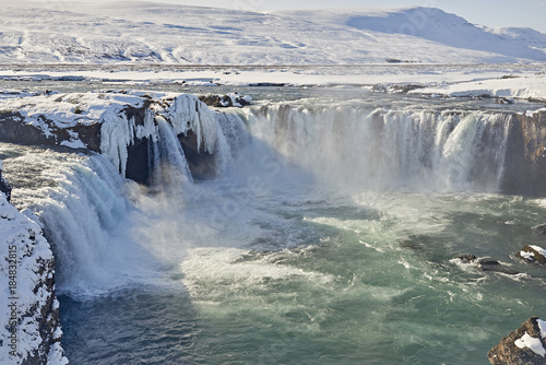Goðafoss or Godafoss waterfall gushes in Iceland.