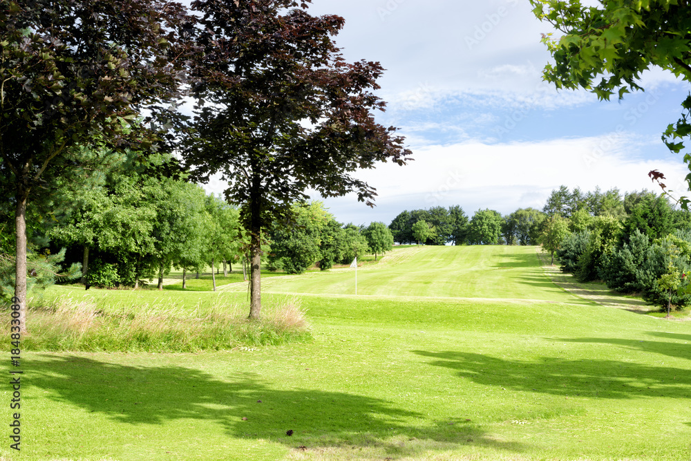 Green golf field in Alexandra park in Glasgow, Scotland, UK