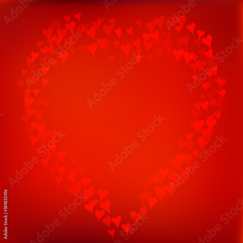 Red background with heart made of defocused blurred hearts.