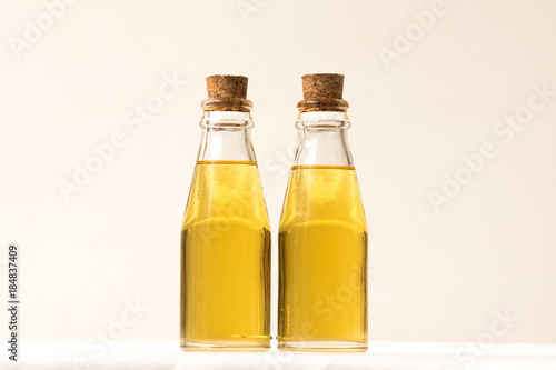 Oil in glass bottle with cork lid