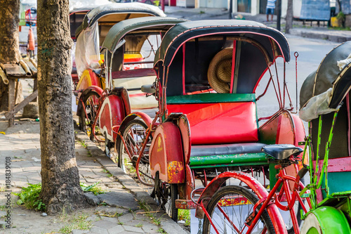 Fototapeta Bevak, rickshaw or pedicab in Indonesia