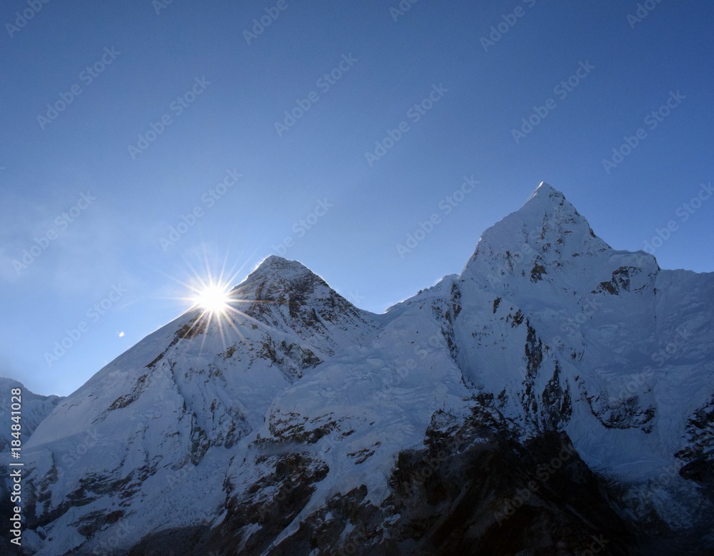 Sunrise behind Mount Everest