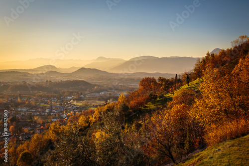 colorful autumn sunset in the italian countryside