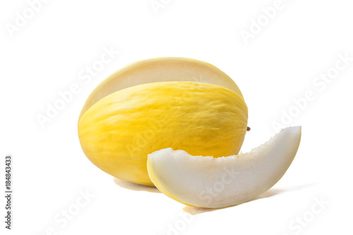 Yellow melon with a slice cut