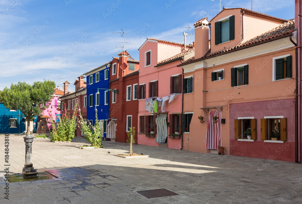 Colorful houses of Burano island / small village near the Venice