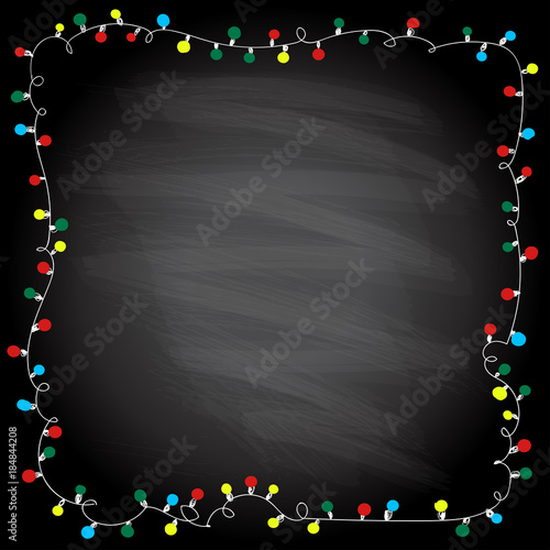 Simple frame with garland lights on a chalkboard background