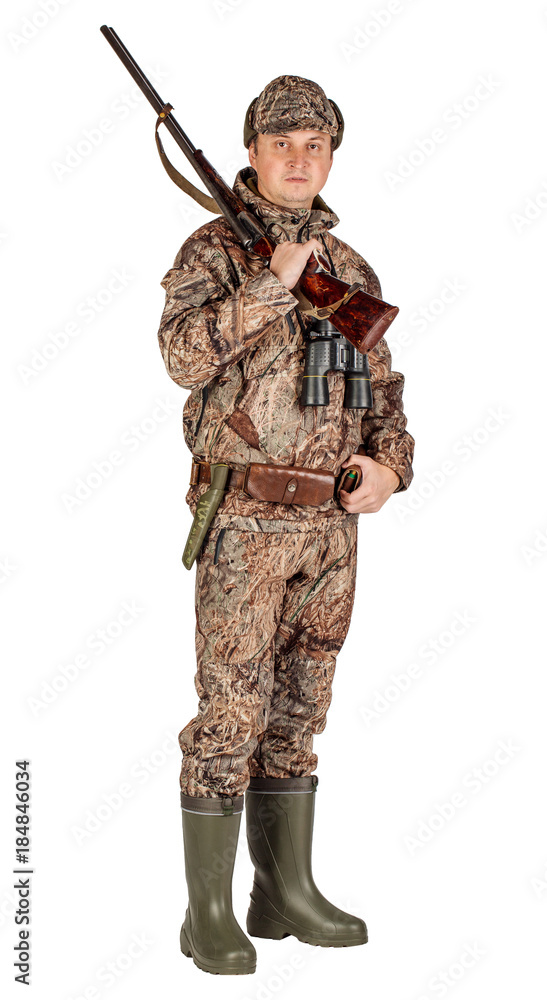male hunter with double barreled shotgun male hunter with double barreled shotgun