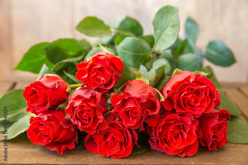 Valentines day background with red roses. Valentine's day table place setting. Wedding background. Mother's, Valentines, Women's Wedding Day concept. Valentines day background with red roses. Valentine's day table place setting. Wedding background. Mother's, Valentines, Women's Wedding Day concept.