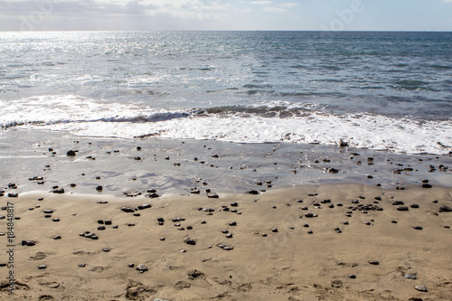 Sand beach with sea stones