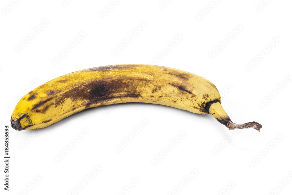 Overripe banana on the white background