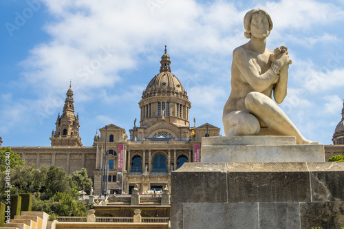 The Montjuic castle of Barcelona behind a statue. photo