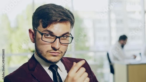 Confident man posing in office