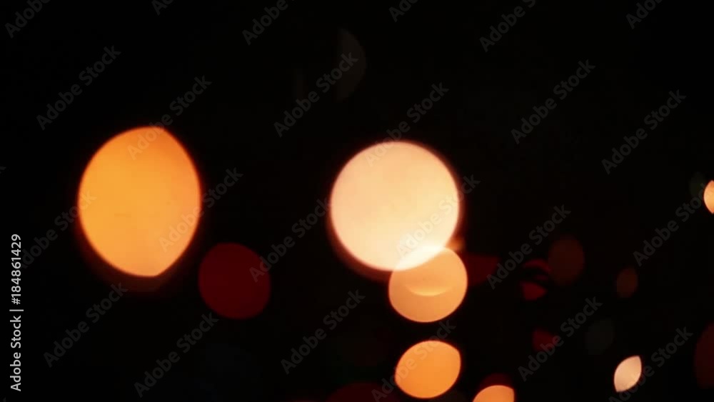 Textured flashing New Year garlands on a dark background. Textured flashing New Year garlands on a dark background.