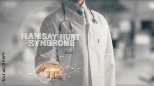 Doctor holding in hand Ramsay Hunt Syndrome photo