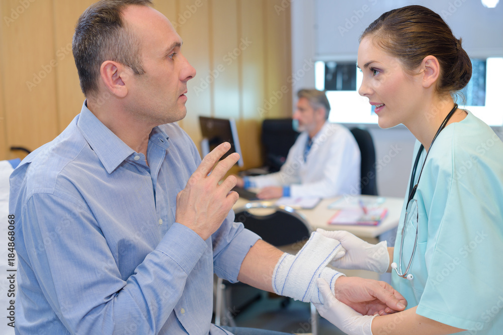 medical assistant entertaining a patient medical assistant entertaining a patient