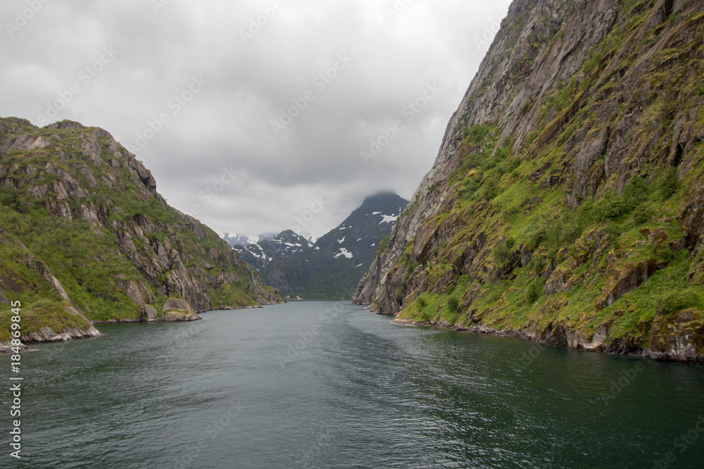The magnificent Trollfjorden in Lofoten/Vesteralen, Norway. Trollfjorden is a narrow fjord, only a hundred meters wide at it's narrowest point. But, even large cruise ships visit the fjord. 