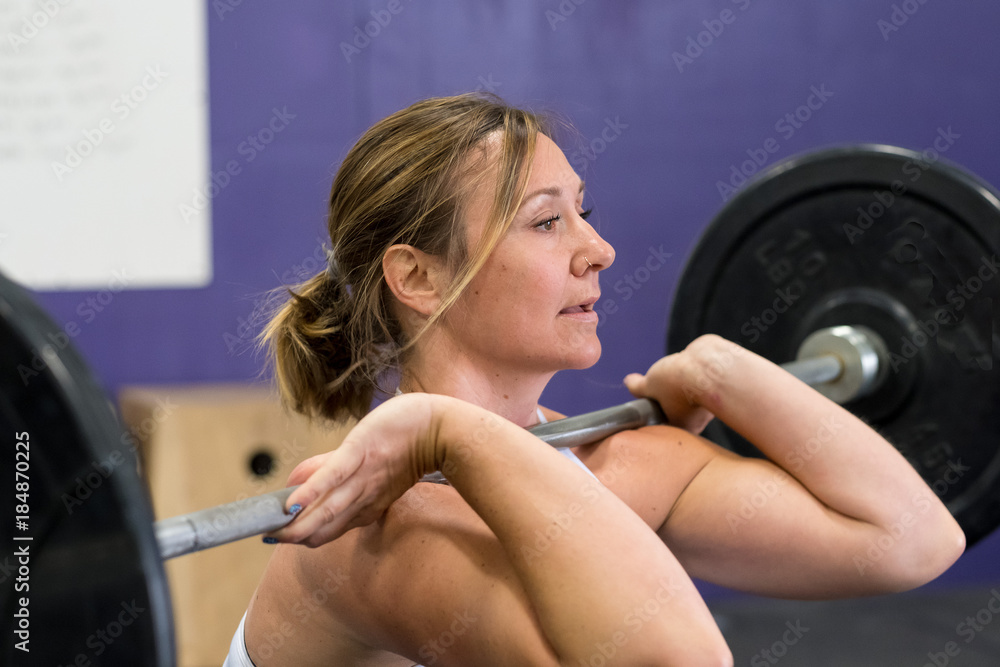 Fototapeta premium Female at Cross Training Fitness Gym