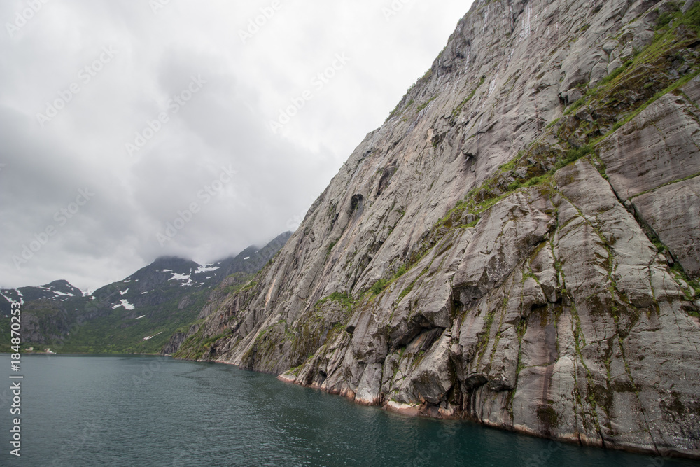 The magnificent Trollfjorden in Lofoten/Vesteralen, Norway. Trollfjorden is a narrow fjord, only a hundred meters wide at it's narrowest point. But, even large cruise ships visit the fjord. 