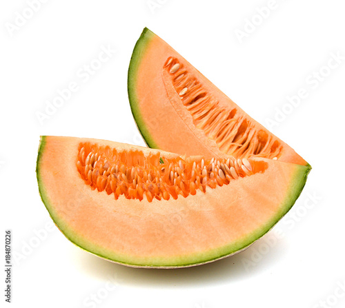 Cantaloupe melon slices on white background