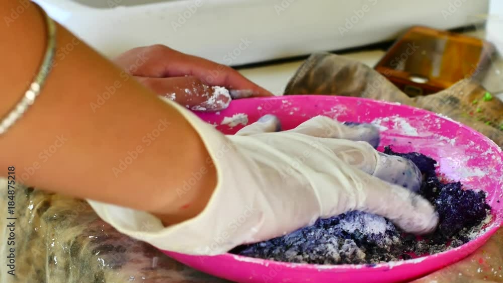 How to make colored powder, holi Festival. The hands are salting food coloring mixed with corn starch to make a flour colorAnd dried until the dry powder for colour will be the Festival holi. How to make colored powder, holi Festival. The hands are salting food coloring mixed with corn starch to make a flour colorAnd dried until the dry powder for colour will be the Festival holi.