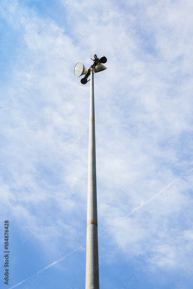 Spot light pole on blue sky and clouds. Spot light pole on blue sky and clouds.