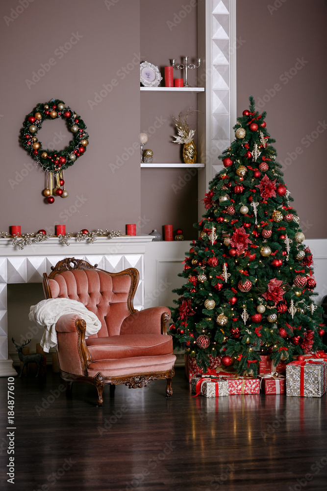 Image of chimney and decorated Christmas tree with gift Image of chimney and decorated Christmas tree with gift