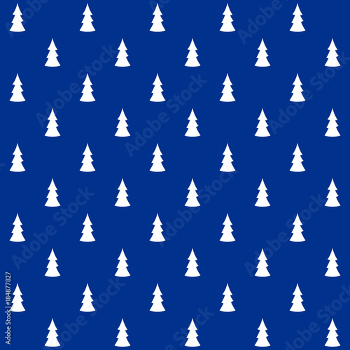 Blue christmas wrapping paper seamless pattern. White firs on the blue background