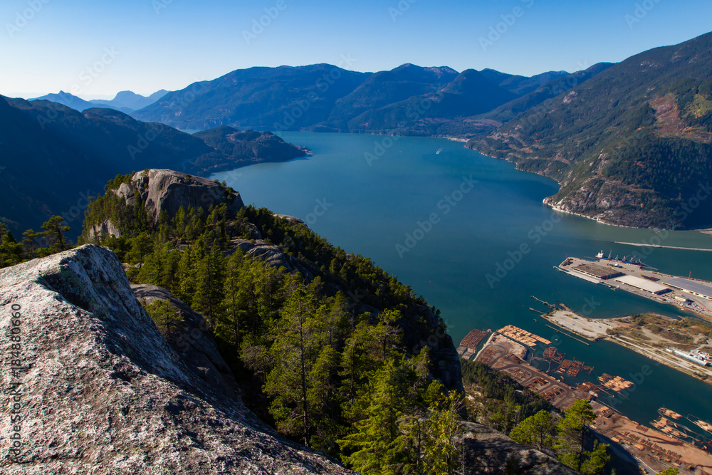 Scenic landscape view of the Howe Sound in Squamish viewed from the summit of the Chief on a sunny fall day